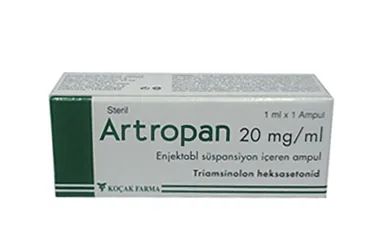 ARTROPAN 20 MG/ML ENJEKSIYONLUK SUSPANSIYON (1 AMPUL) kutusu, süspansiyon formunda triamsinolon heksasetonid içerir. Üretici: KOÇAK FARMA İLAÇ VE KİMYA SANAYİ A.Ş.