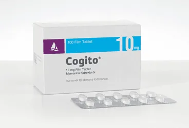 COGITO 10 MG FILM KAPLI TABLET (100 FILM KAPLI TABLET) ürün ambalajı, film kaplı tablet formunda memantin içerir. Üretici: SANTA FARMA İLAÇ SAN. A.Ş.