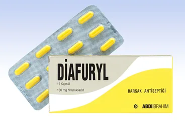 DİAFURYL 100 MG 12 KAPSÜL kutusu, kapsül formunda nifuroksazid içerir. Üretici: ABDİ İBRAHİM İLAÇ SANAYİ VE TİCARET A.Ş.
