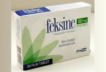 FEKSINE 180 MG FILM KAPLI TABLET (20 TABLET) kutusu, film kaplı tablet formunda feksofenadin hidroklorid içerir. Üretici: DROGSAN İLAÇLARI SAN. VE TİC. A.Ş.