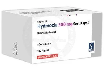 HYDMOXIA 500 MG SERT KAPSUL (100 KAPSUL) kutusu, kapsül formunda hidroksiüre içerir. Üretici: SABA İLAÇ SANAYİİ VE TİCARET ANONİM ŞİRKETİ.