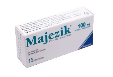 Flurbiprofen içeren film kaplı tablet: MAJEZIK 100 MG 15 FİLM TABLET ambalajı. Üretici: SANOVEL İLAÇ SANAYİ VE TİCARET ANONİM ŞİRKETİ.