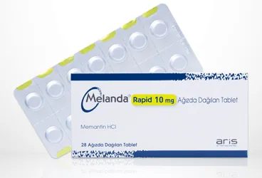 MELANDA RAPID 10 MG AGIZDA DAGILAN 28 TABLET kutusu, tablet formunda memantin içerir. Üretici: ALİ RAİF İLAÇ SANAYİ A.Ş.