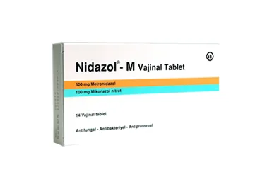 NIDAZOL-M 500/ 100 MG VAJINAL TABLET (imidazol kombinasyonları -vajinal) ambalajı, tablet. Üretici: MENARİNİ SAĞLIK VE İLAÇ SANAYİ TİCARET ANONİM ŞİRKETİ.