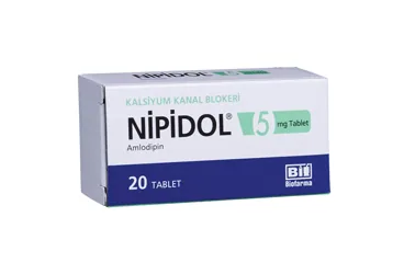 Amlodipin içeren tablet: NIPIDOL 5 MG 20 TABLET ürün ambalajı. Üretici: BİOFARMA İLAÇ SANAYİ VE TİCARET A.Ş.