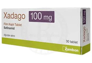 XADAGO 100 MG FILM KAPLI TABLET (30 TABLET) ürün ambalajı. Safinamid içeren film kaplı tablet. Üretici: DEM İLAÇ SAN. VE TİC. A.Ş.